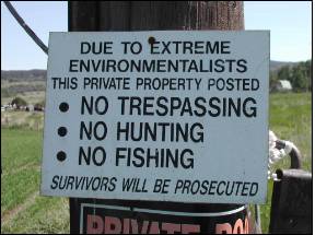 Extreme environmentalists warning sign courtesy Geocaching dot com