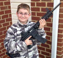 Kid with gun Kid with gun